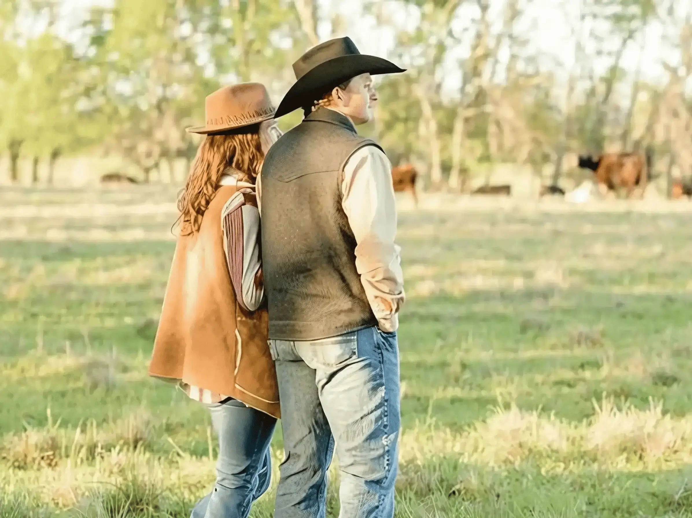 This is Sydney and Dalton at Diamond D Ranch enjoying the scenery with cows in the background