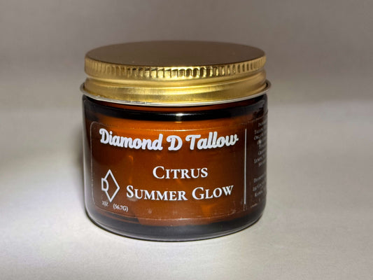 Jar of Diamond D Tallow Citrus Summer Glow on a neutral background